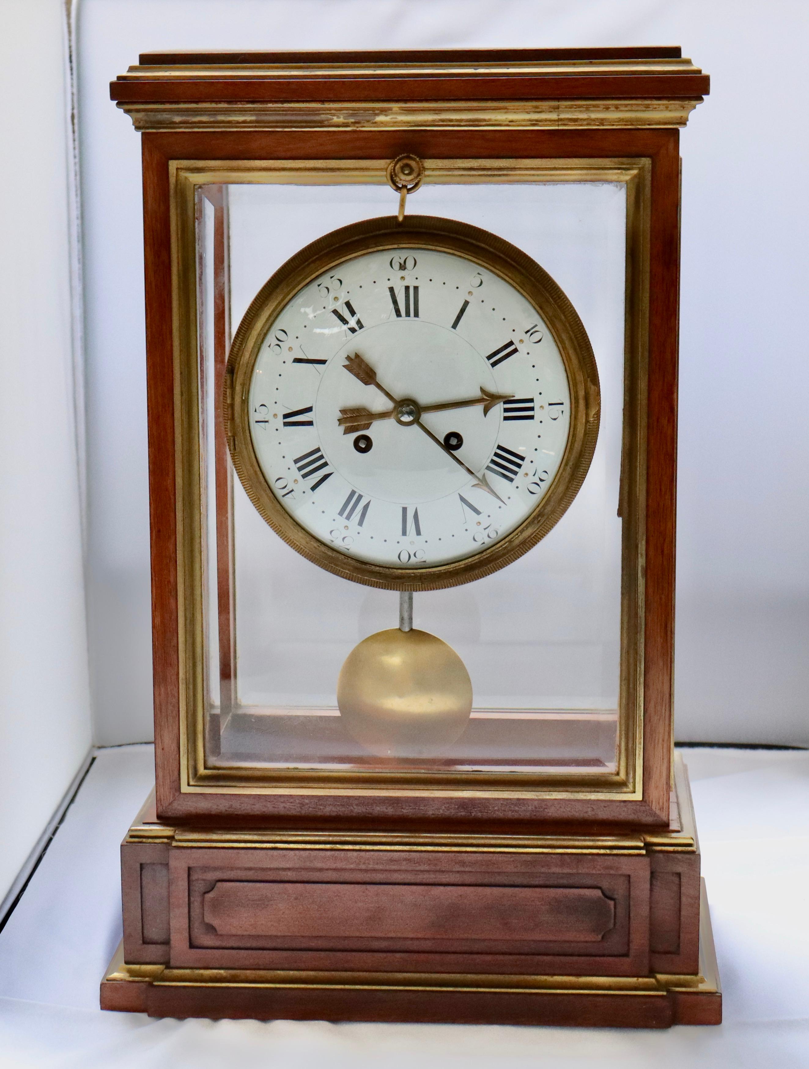 Impressive ormolu-mounted mantel clock regulator
Bevelled glass on each face
Enamelled dial
The movement signed Marnyhac and numbered 4285
With its original key and pendulum,
Circa 1860
In working conditions

Marnyhac et Cie was used as the