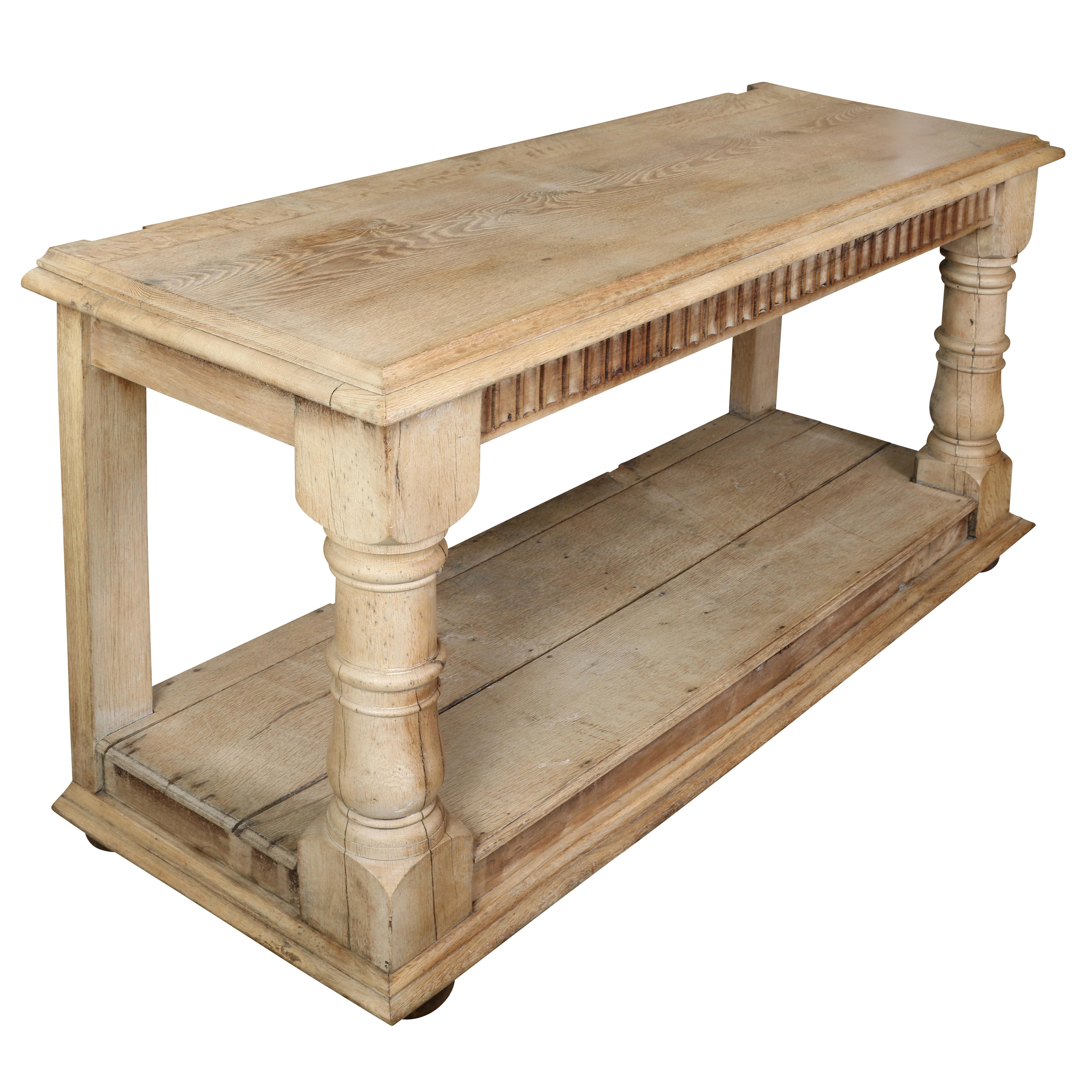 A great looking bleached oak console with a lower shelf. A 