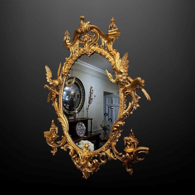 Sculpté à la main Miroir mural ovale du 19e siècle à la manière de Thomas Johnson en vente