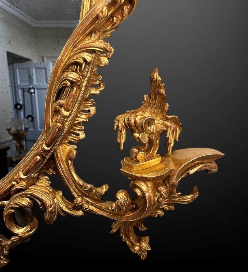 Miroir mural ovale du 19e siècle à la manière de Thomas Johnson en vente 1