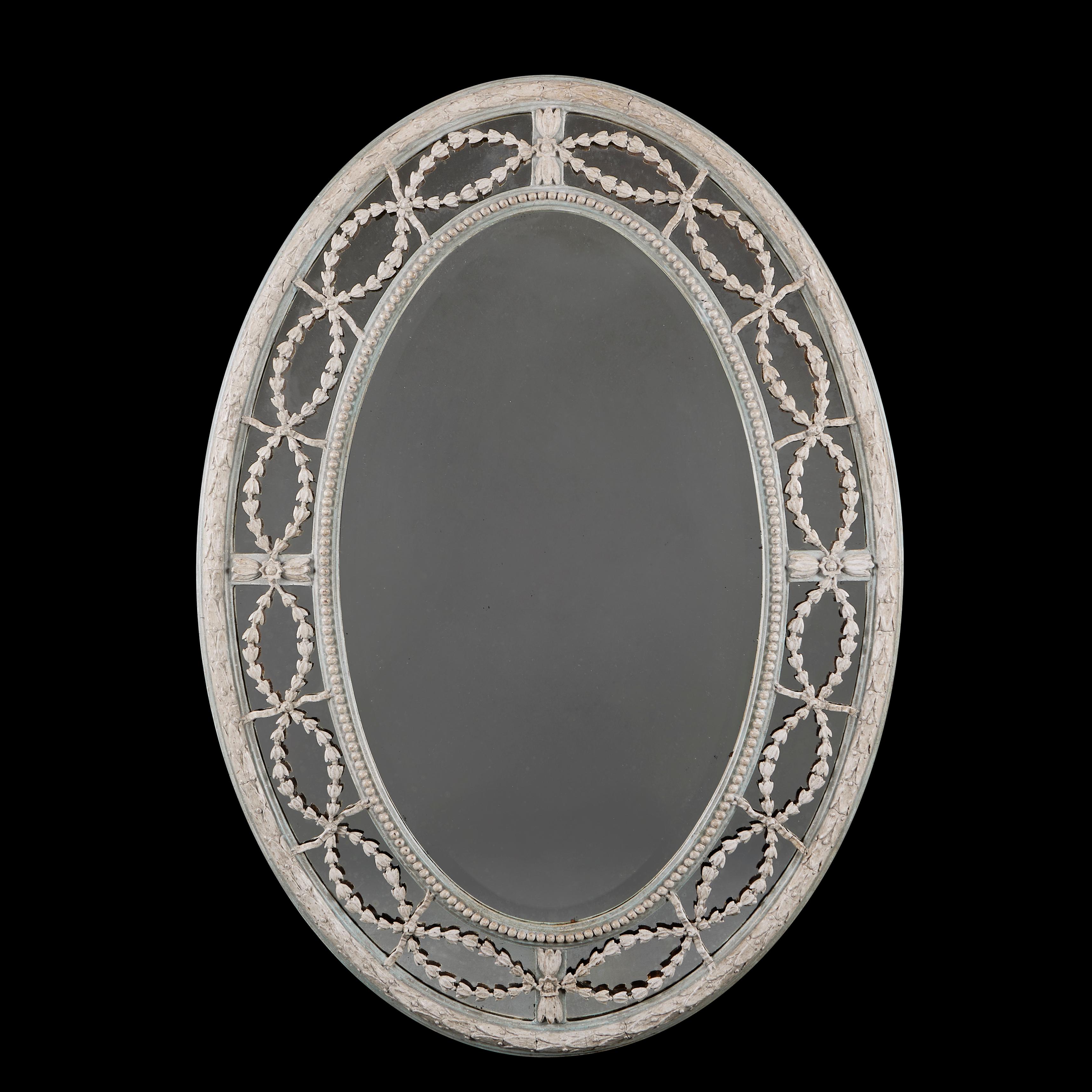 England, um 1880

Ovaler Spiegel aus dem späten neunzehnten Jahrhundert mit blau-weiß bemaltem Rahmen, der Spiegelglasrand ist mit geschnitzten und durchbrochenen Beuteln und Bögen verziert. Der Spiegel kann sowohl im Hoch- als auch im Querformat