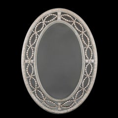 A 19th Century Painted Oval Mirror