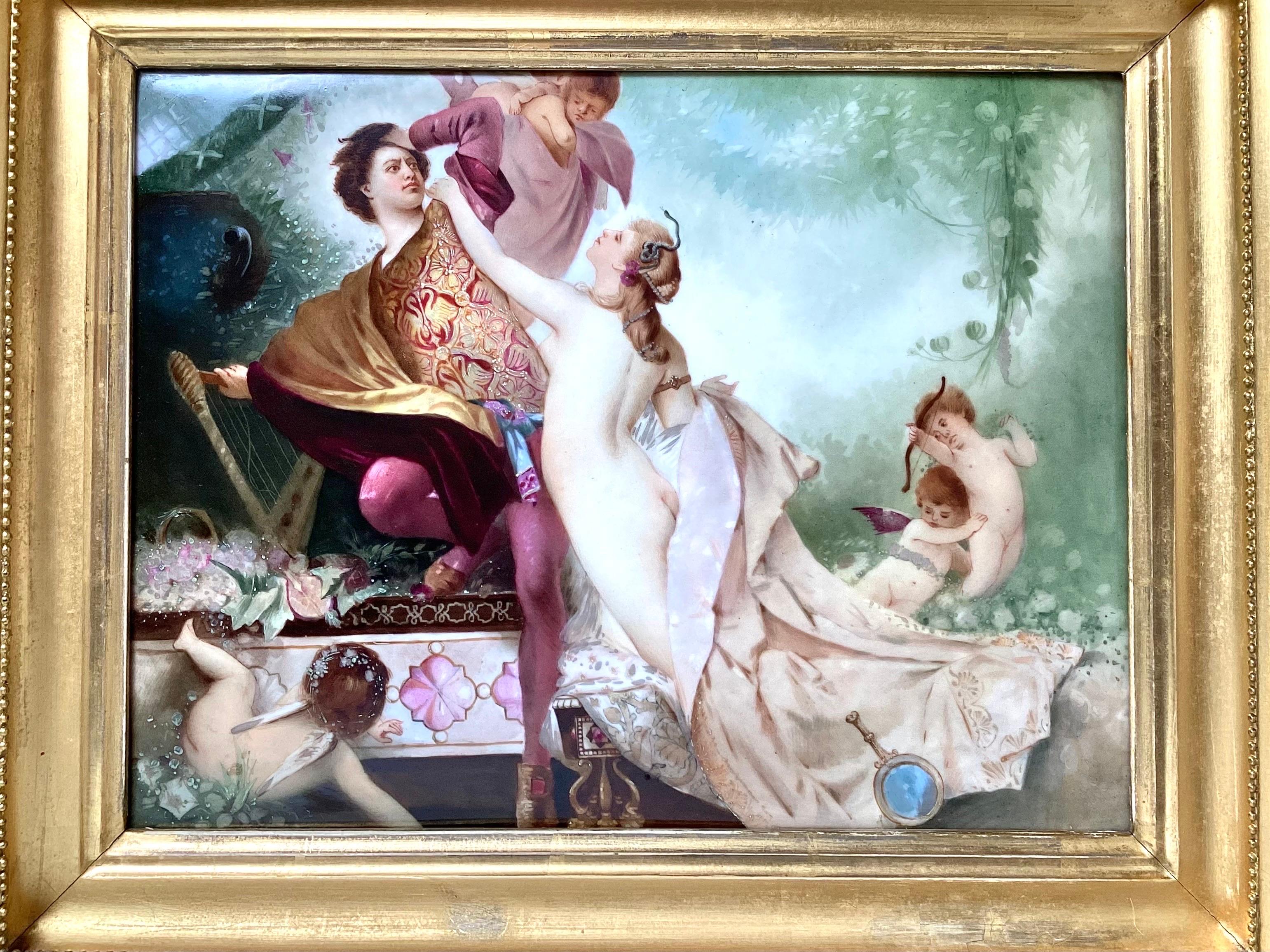 A painting on porcelain of a nobleman and nude woman with cupids, elaborately painted and highly detailed. The original gilt wood frame with reticulated outer frame. The quality of painting is excellent with the initials of the Artist on back. The