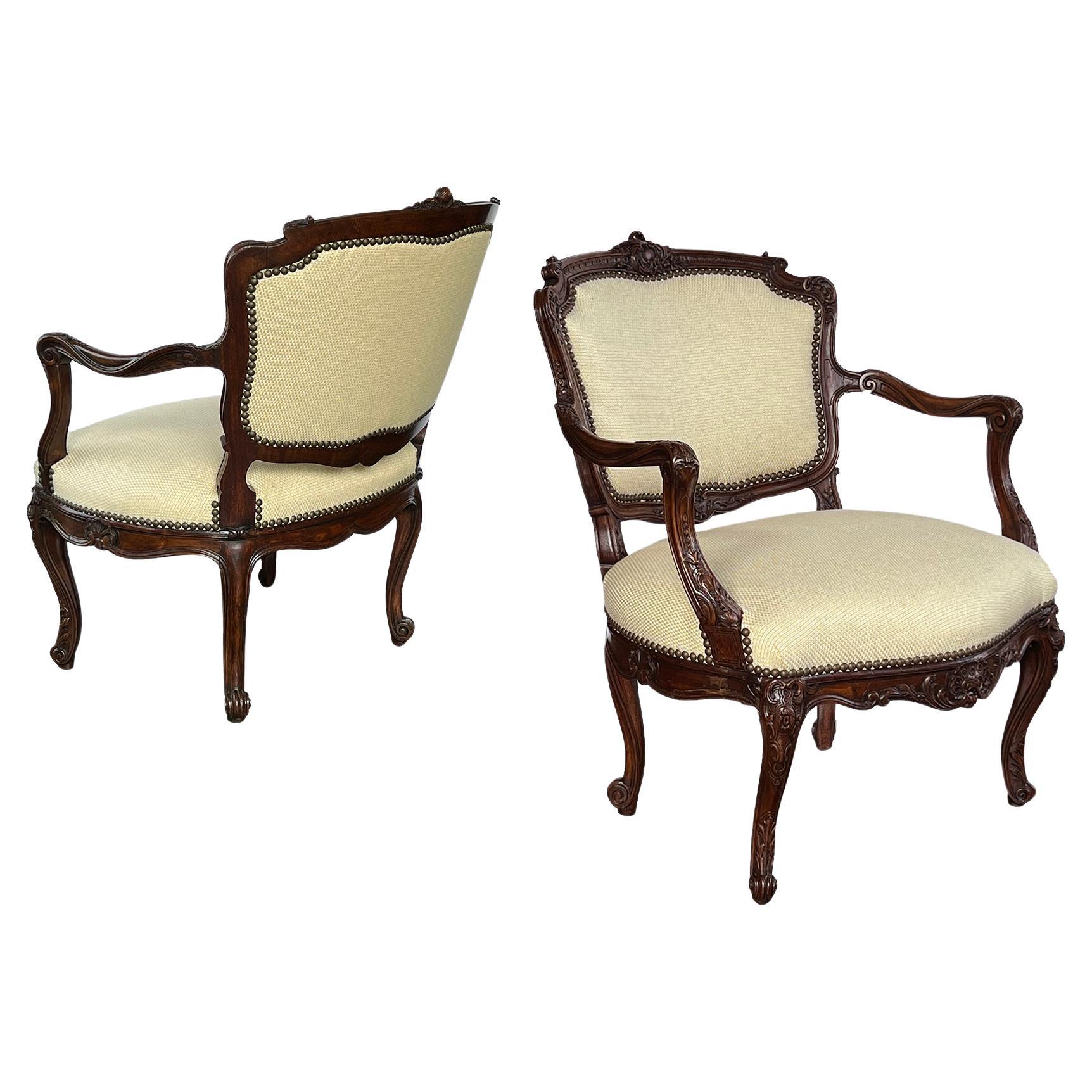 A 19th Century Pair French Rococo Style Carved Open Arm Chairs For Sale