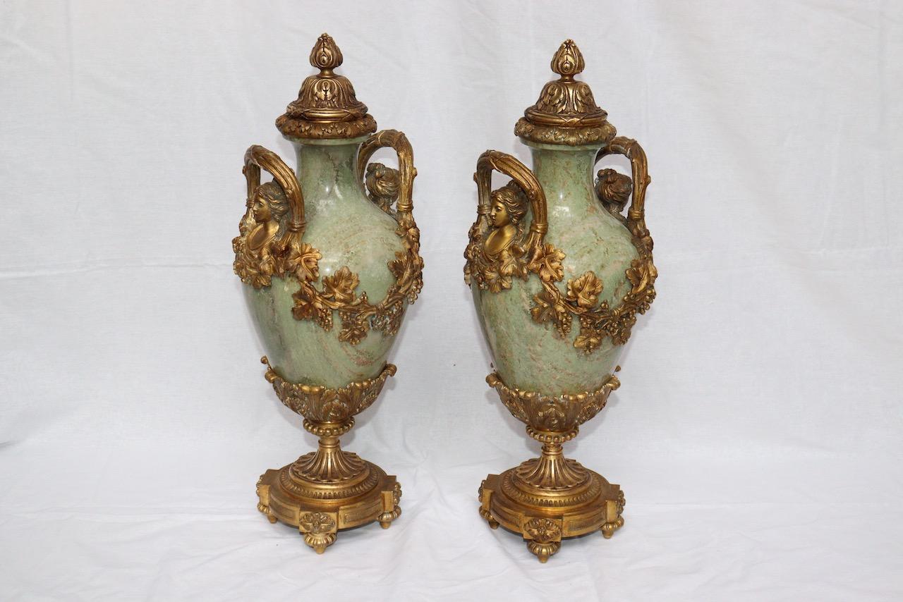 A 19th French pair of ormolu-mounted Napoleon III Louis XVI style two handles green 