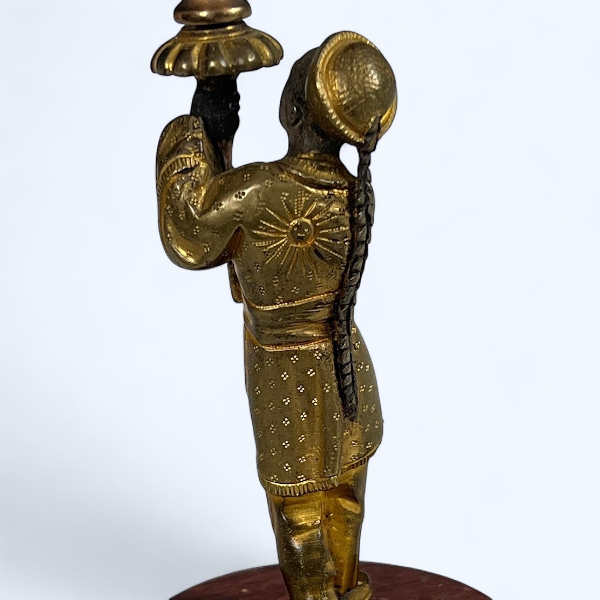 XIX secolo A 19Th Century Parcel Gilt-Bronze Candlestick in vendita