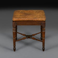 A 19th Century Regency Cane Stool with Leather Cushion