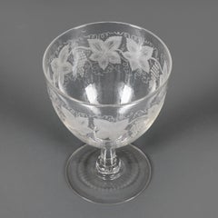 Un gobelet en verre transparent gravé de style Régence du XIXe siècle
