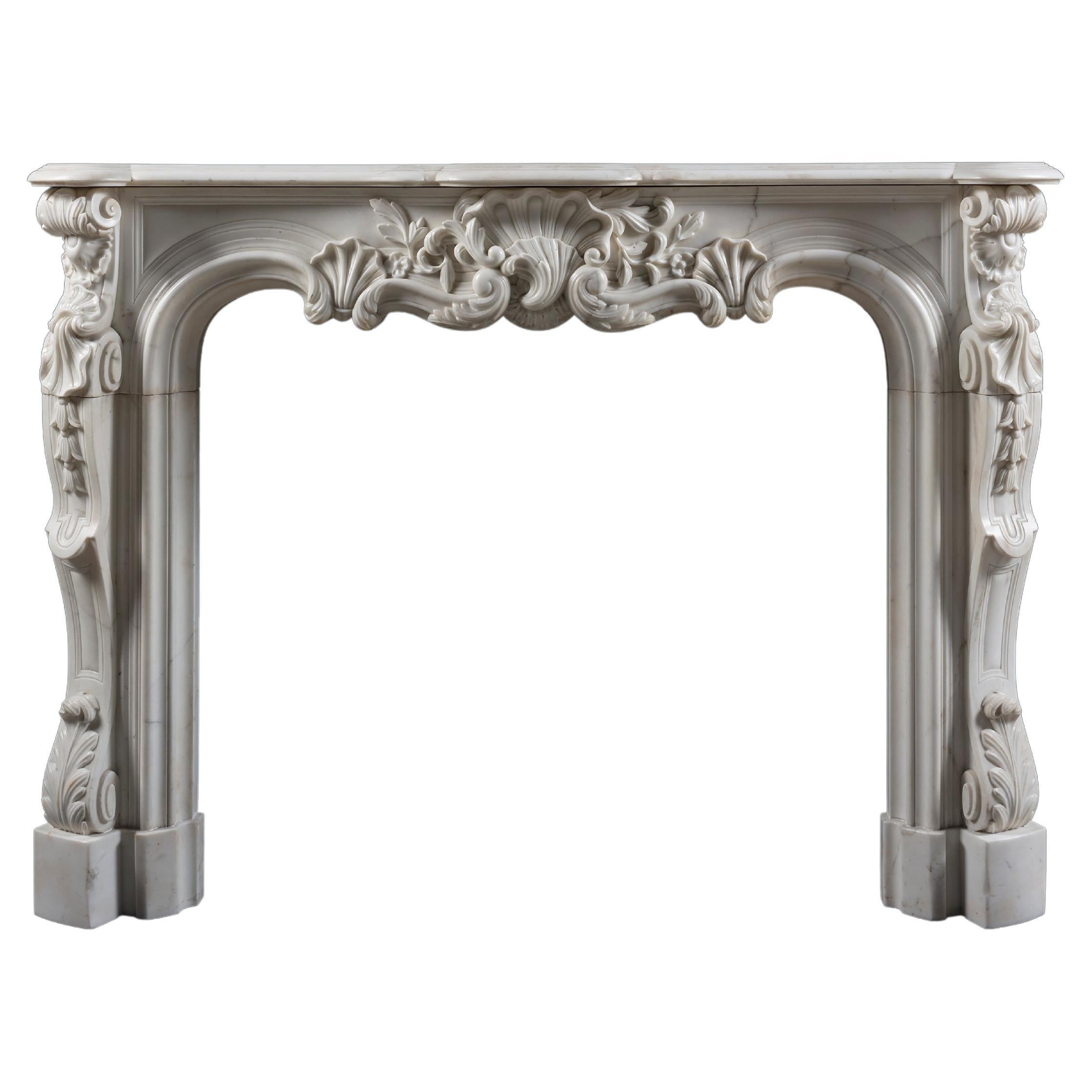 A 19th Century Rococo Chimneypiece in Louis XV Style For Sale