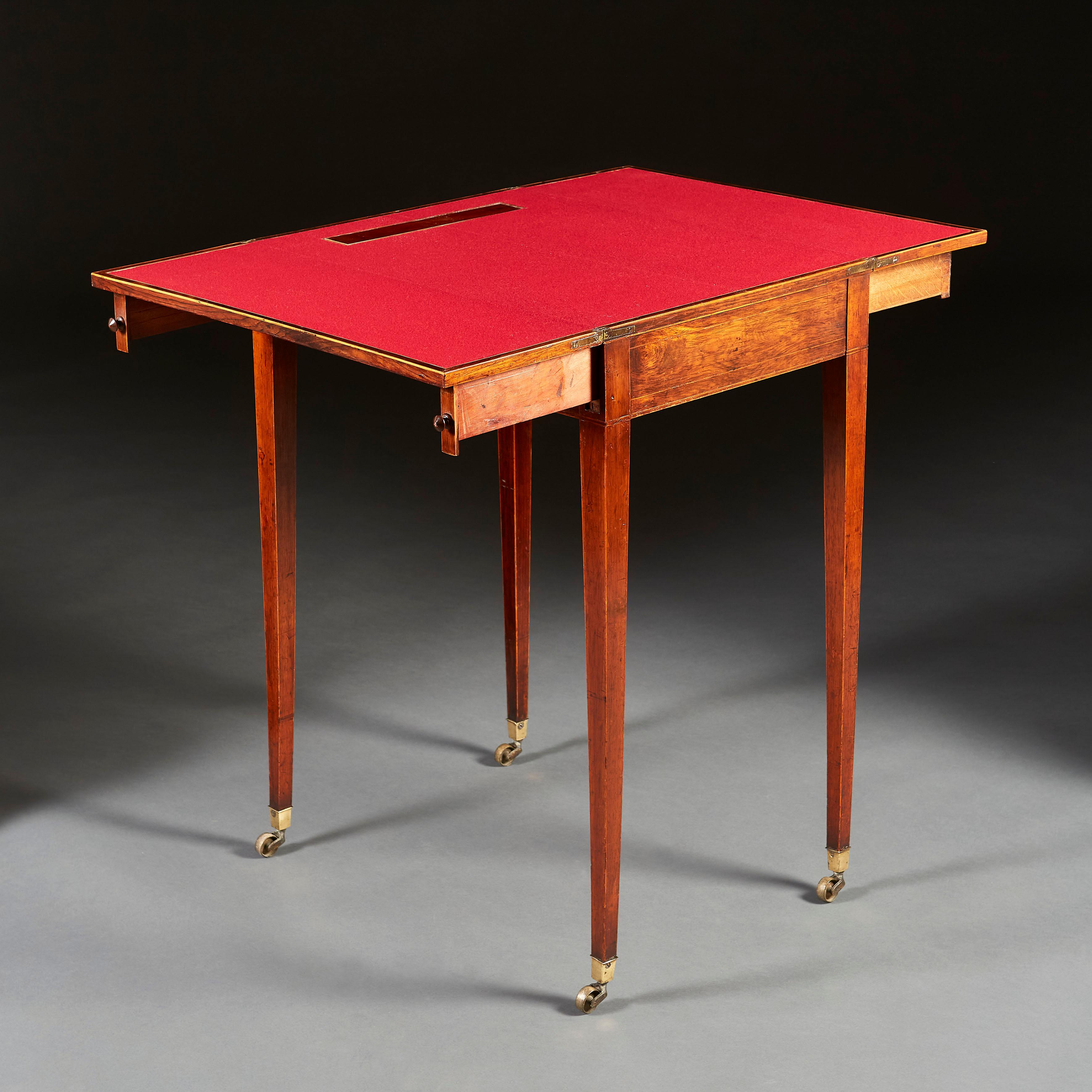 An unusual mid nineteenth century rosewood writing table, the top opening to reveal a crimson baize writing surface, with hidden inset inkwell, with one drawer to the frieze and sliders to the back, all with turned wood handles, all supported on