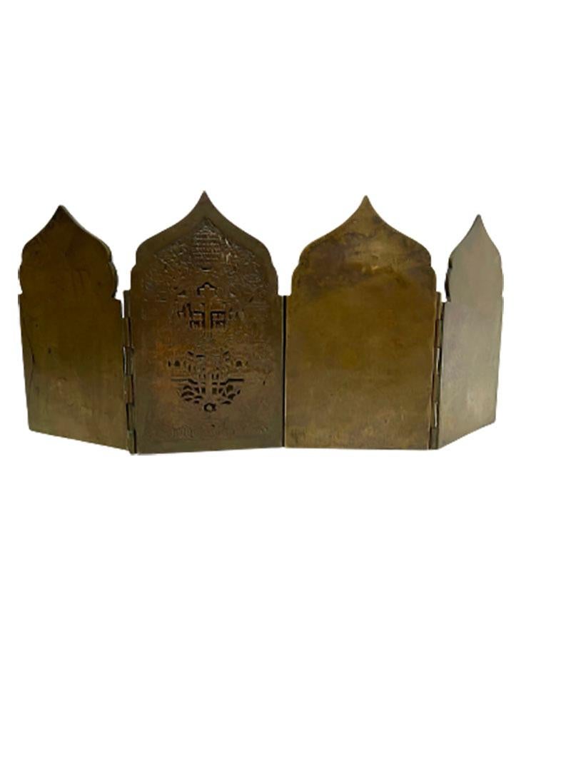A 19th century Russian bronze travel icon, a 4-panel Tetraptych

A Russian bronze travel icon, a 4-panel Tetraptych. 
With Russian Orthodox depictions of the holidays in 4-panel folding bronze 
The travel icon is 16.2 cm high, 38 cm wide when