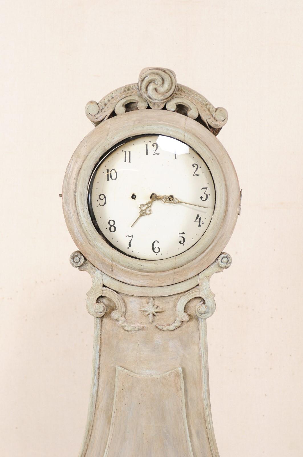 Hand-Carved 19th Century Swedish Fryksdahl Clock with Ornately Carved Crown and Neck