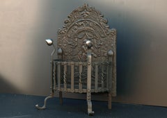 19th Century Wrought Iron Firegrate with Decorative Cast Iron Fireback