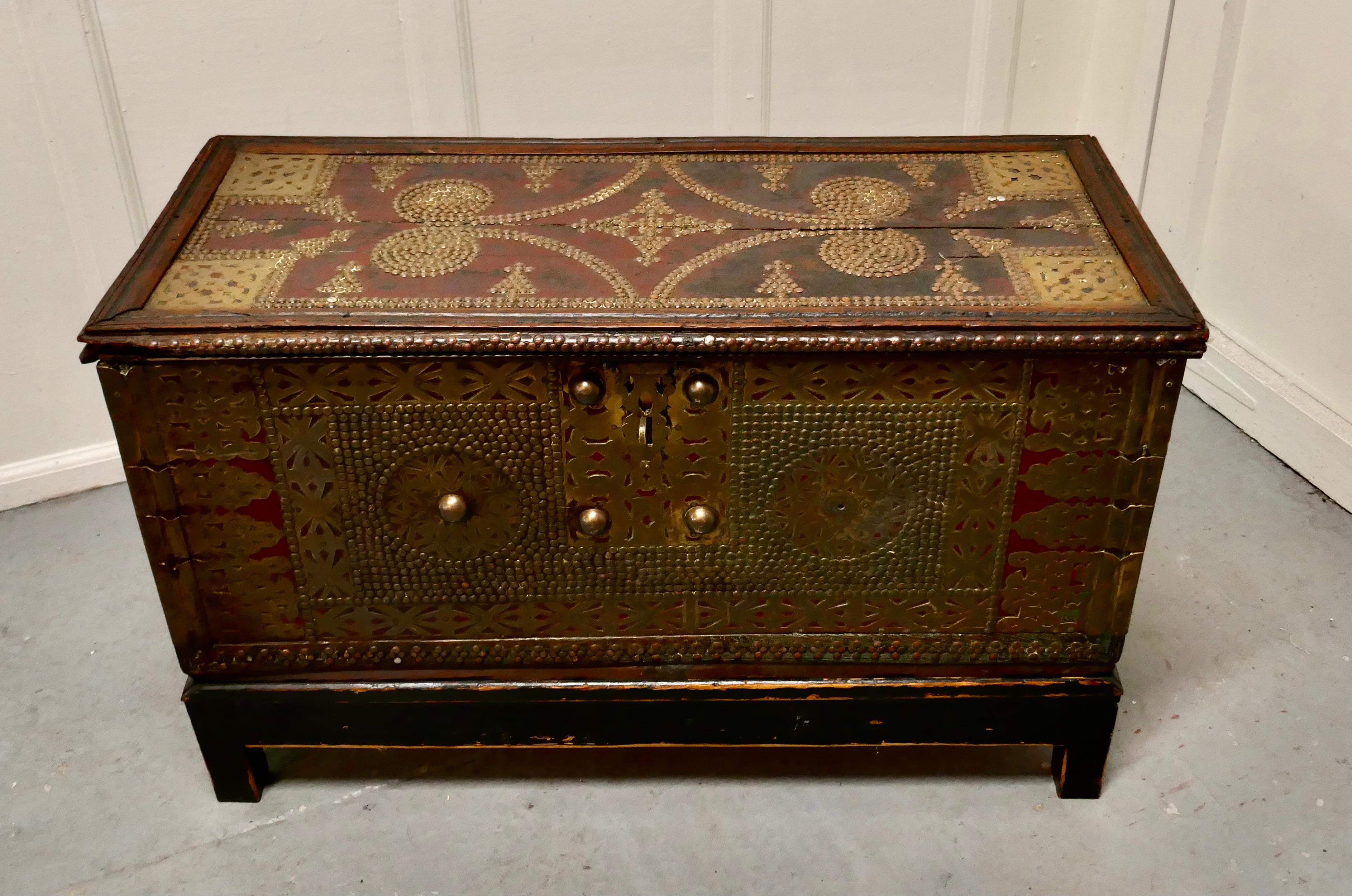 A 19th century Zanzibar trunk.


A superb piece showing the wonderful craftsmanship of the brass workers 
This hardwood chest which originally was painted in red some of which has now worn away is decorated with brass studs and fretwork
Dowry