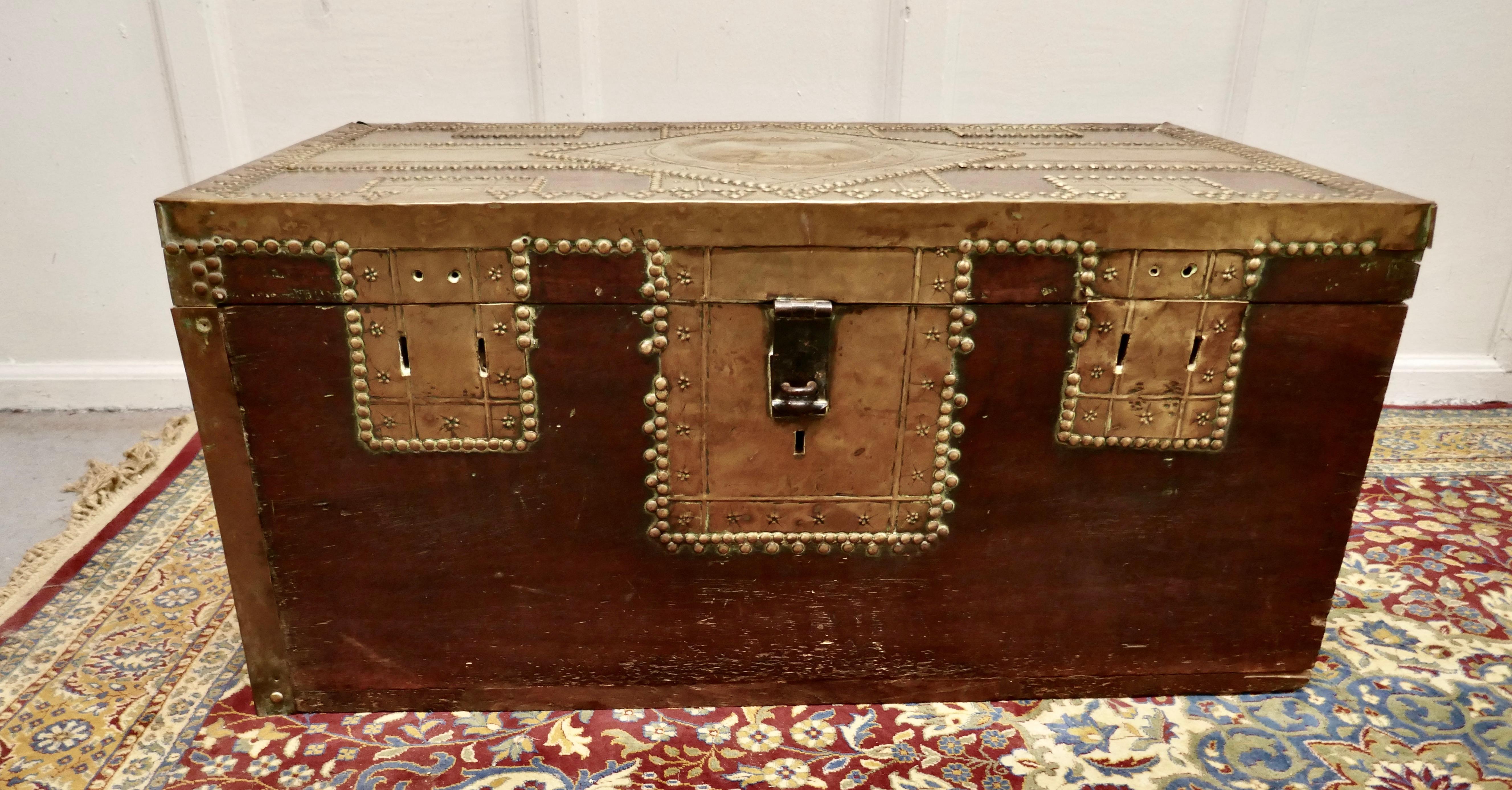 A 19th Century Zanzibar trunk

A superb piece showing the wonderful craftsmanship of the brass workers 
This hardwood chest is decorated with brass, studs and fretwork
Dowry chests like this were often used in the export of spices, rugs, and