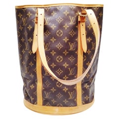 A 2000 Louis Vuitton Monogram Coated Canvas and Leather Bucket GM Tote Bag