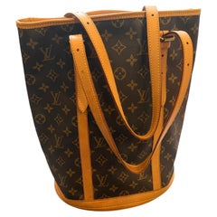 A 2000 Louis Vuitton Monogram Coated Canvas and Leather Bucket GM Tote Bag
