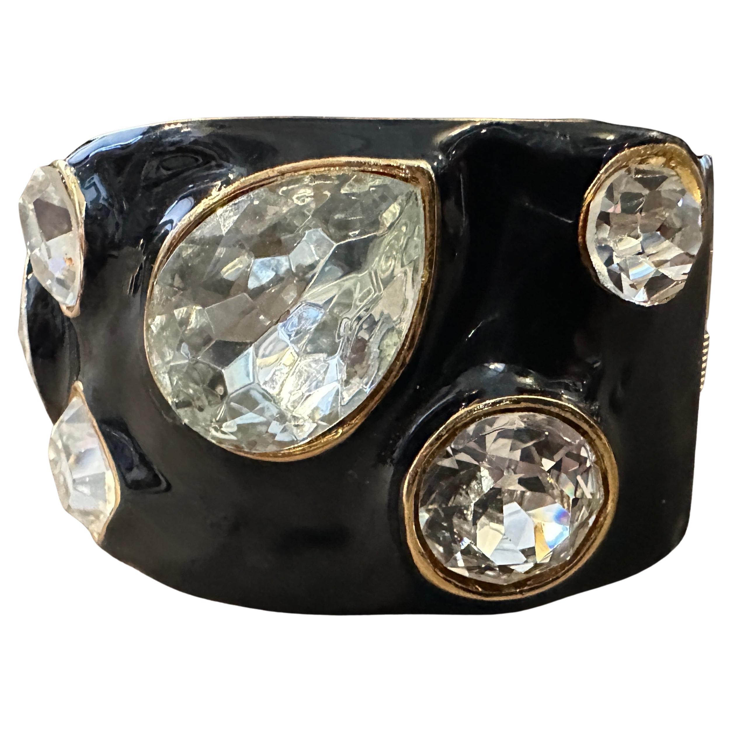 A 2000s Black Enamel Brass and Rhinestone Bangle Bracelet by Kenneth Jay Lane