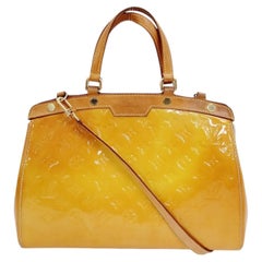 A 2002 Louis Vuitton Brea Monogram Yellow Vernis Patent Leather Shoulder Bag