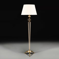 A 20th Century Brass and White Enamel Floor Lamp by Maison Arlus