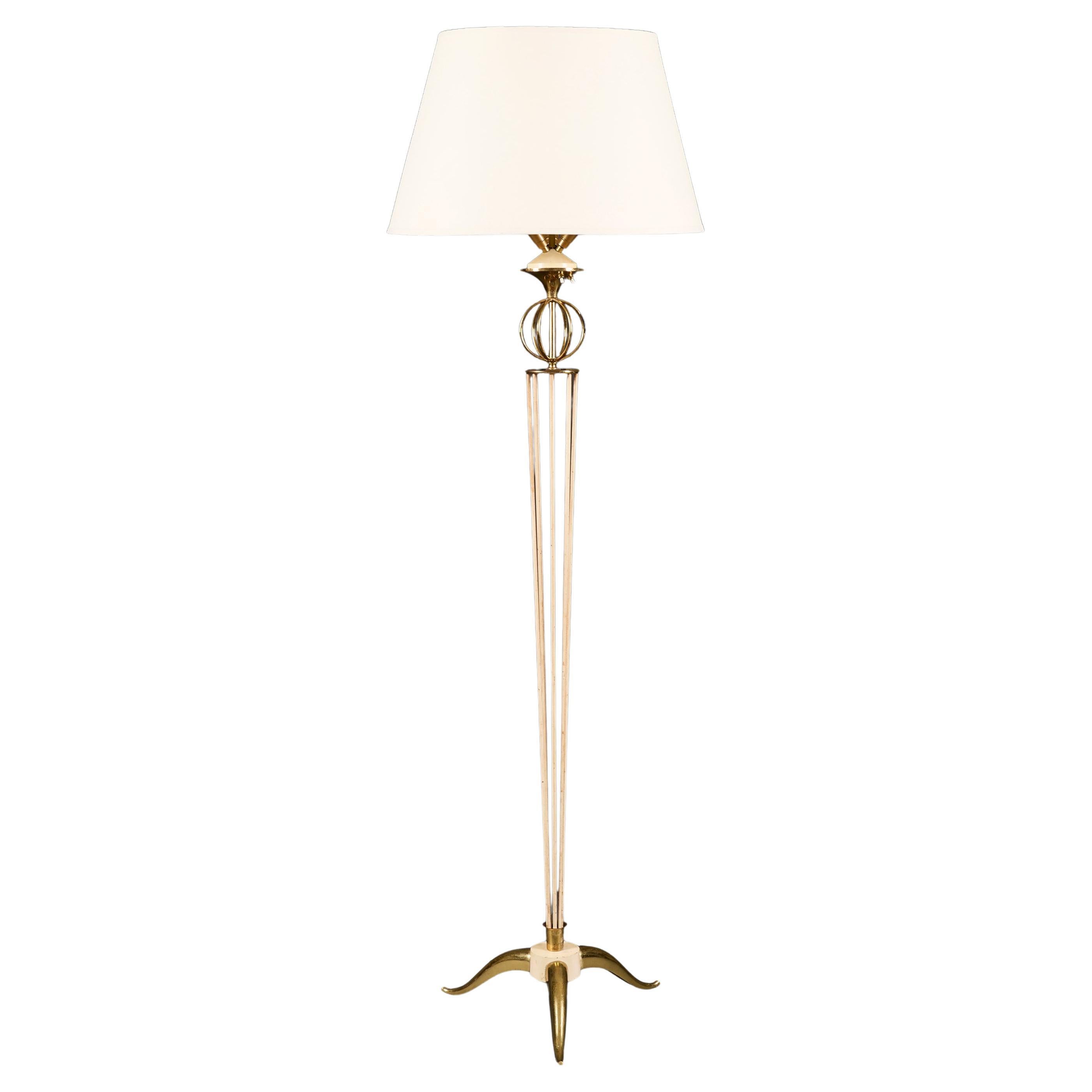 A 20th Century Brass and White Enamel Floor Lamp by Maison Arlus