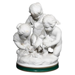 Antique A 20th Century Capodimonte bisque group of the putti