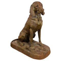 20th Century Cast Iron Figure of a Dog with a Belt at Its Feet