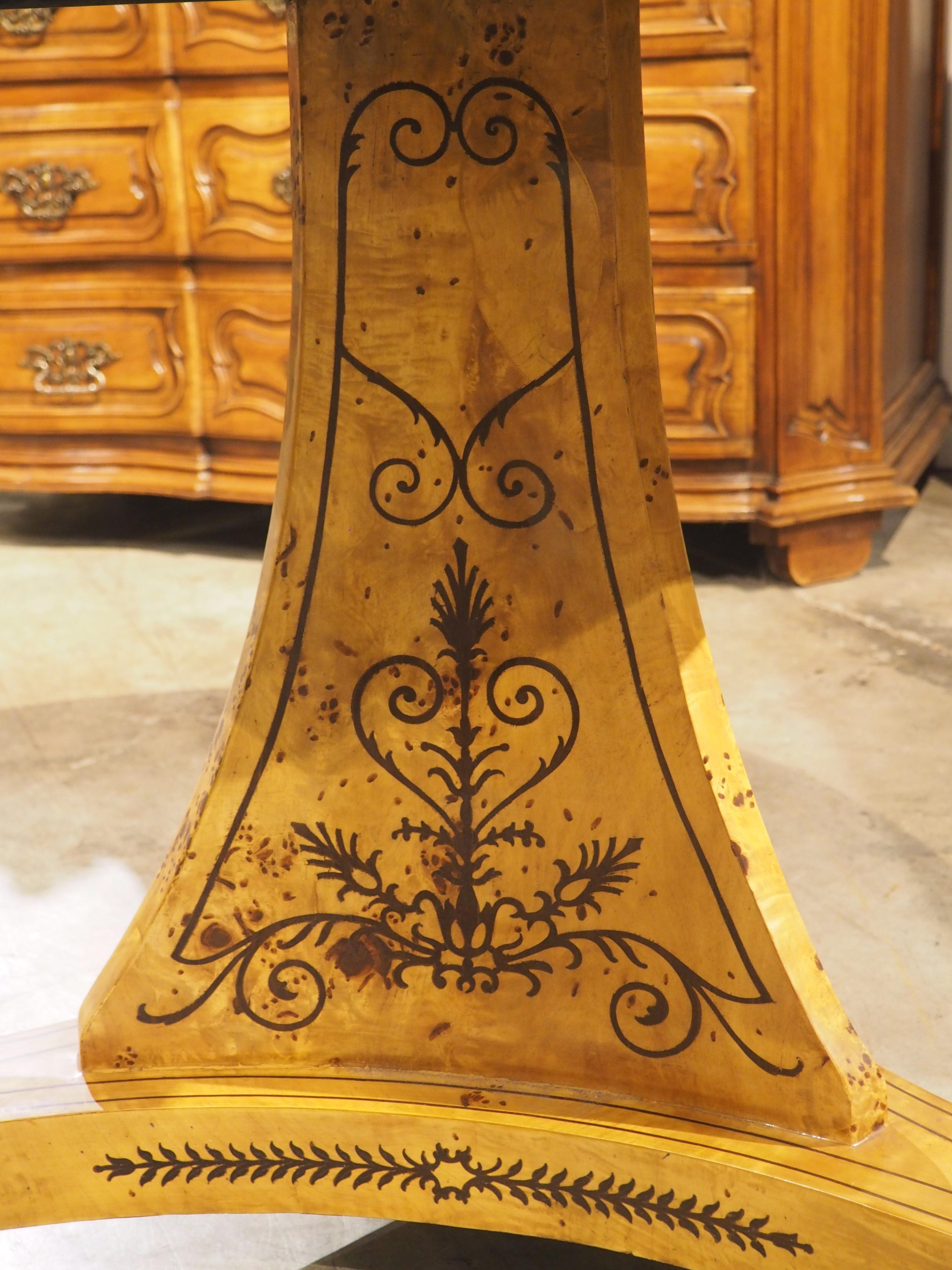 A 20th Century French Charles X Style Center Table with Marquetry Decor 7