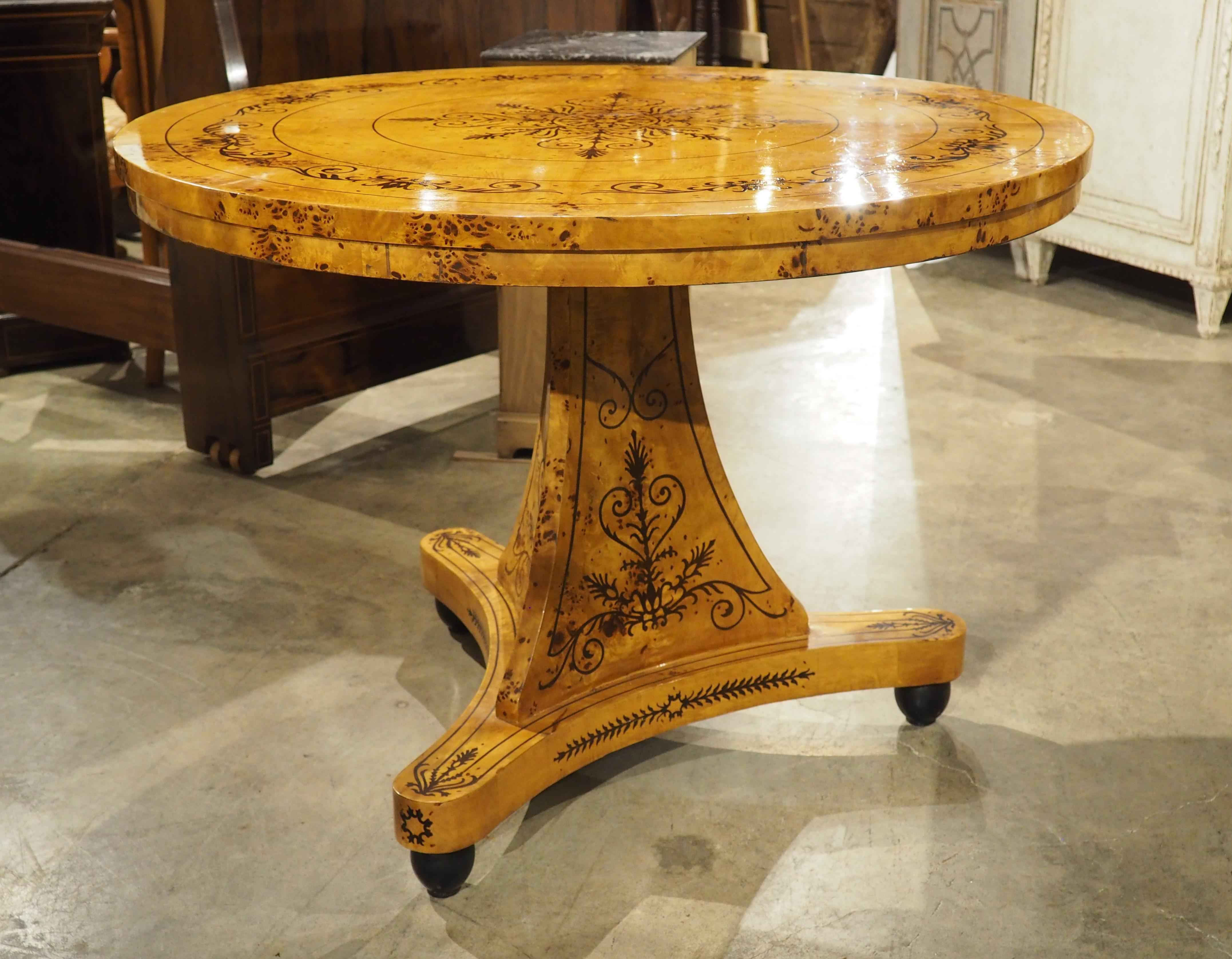 A 20th Century French Charles X Style Center Table with Marquetry Decor 2