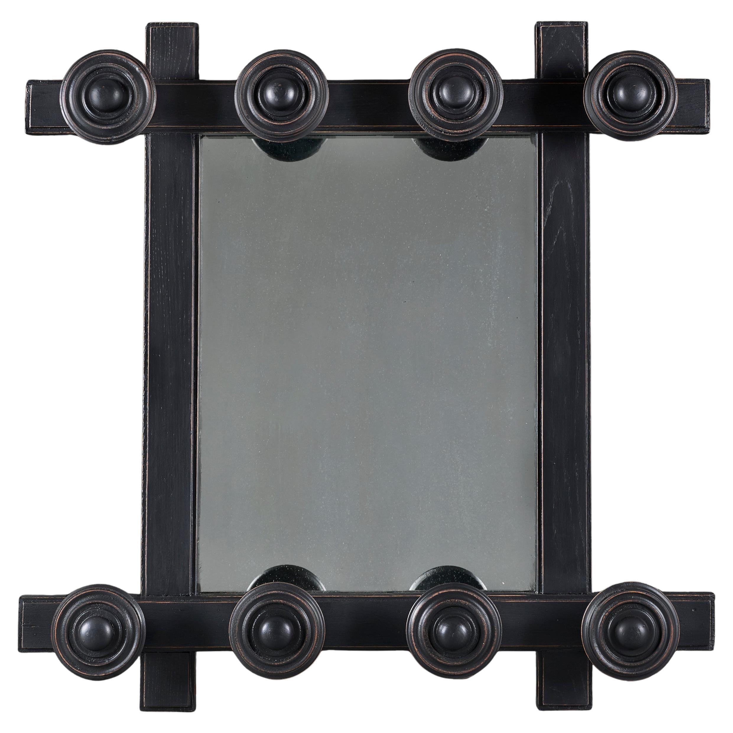 A 20th Century French Modernist Ebonised Mirror For Sale