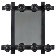 A 20th Century French Modernist Ebonised Mirror