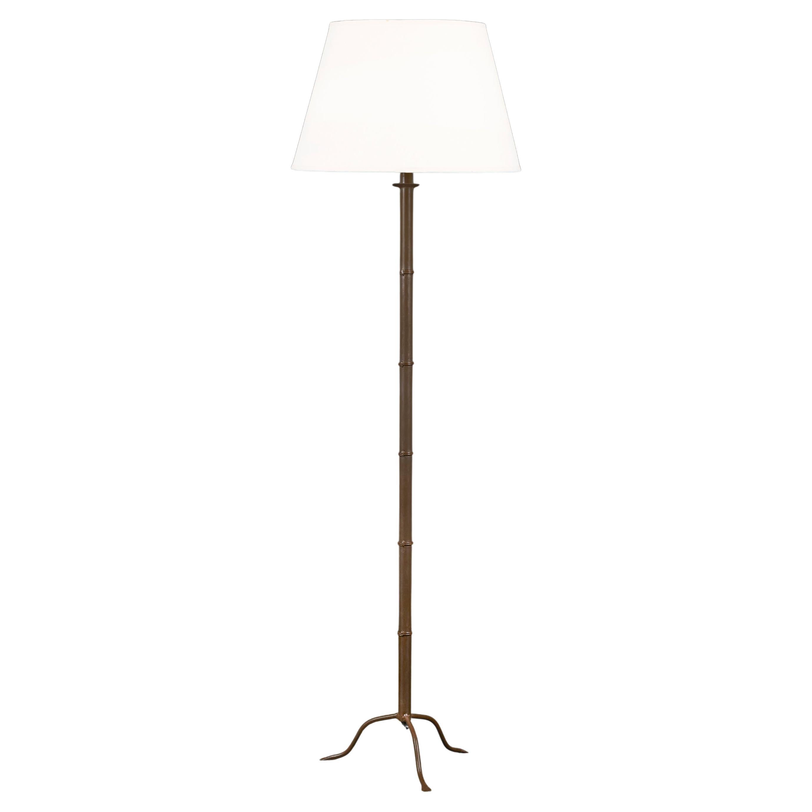 A 20th Century French Patinated Iron Floor Lamp