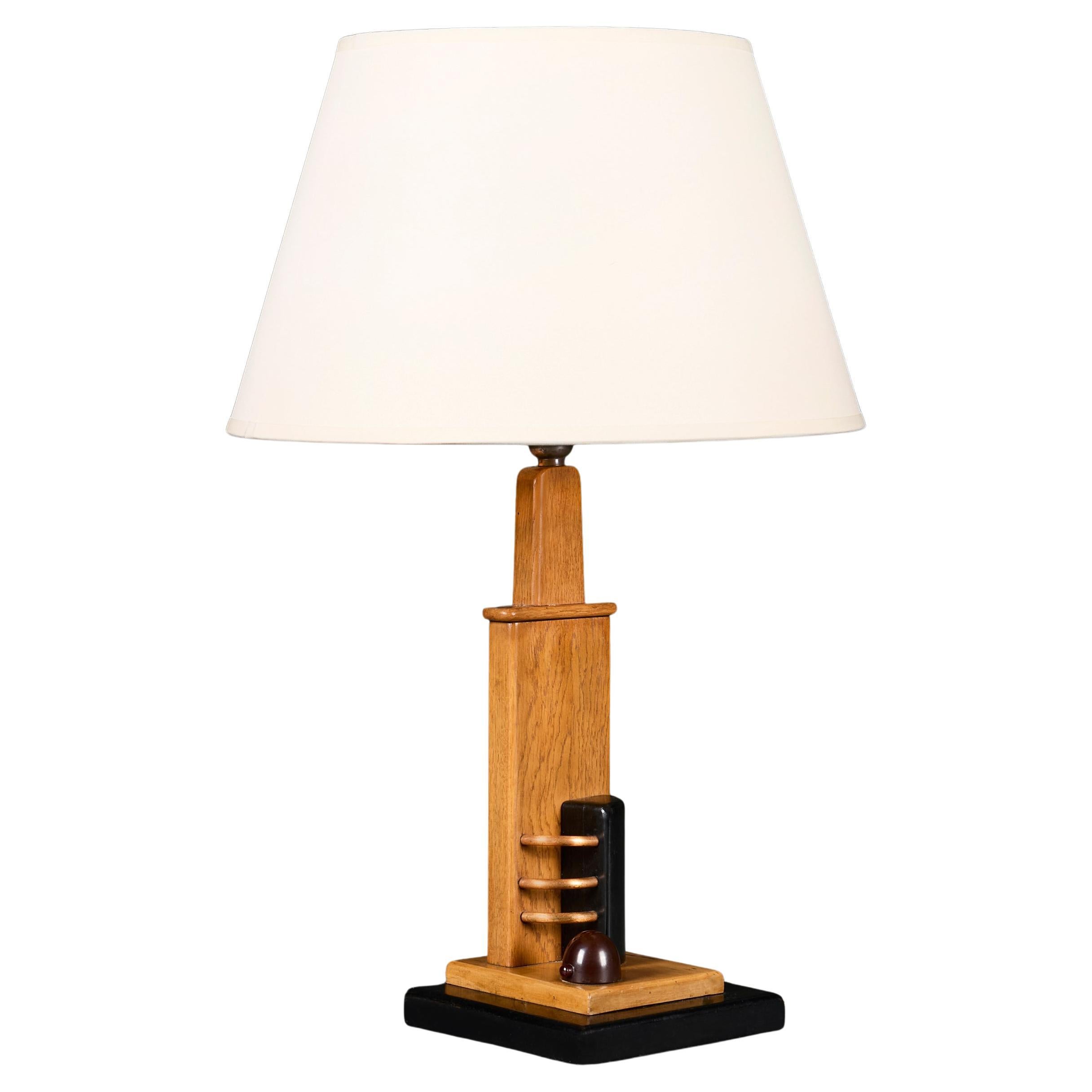 A 20th Century Modernist Oak and Ebonised Desk Lamp For Sale
