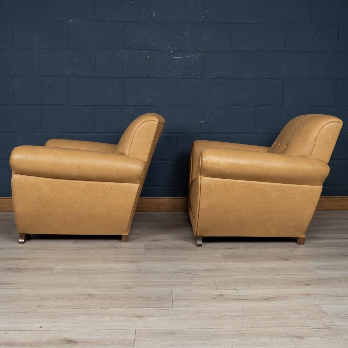 British A 20th Century Pair Of English Beige Faux Ostrich Skin Leather Armchairs c.1960