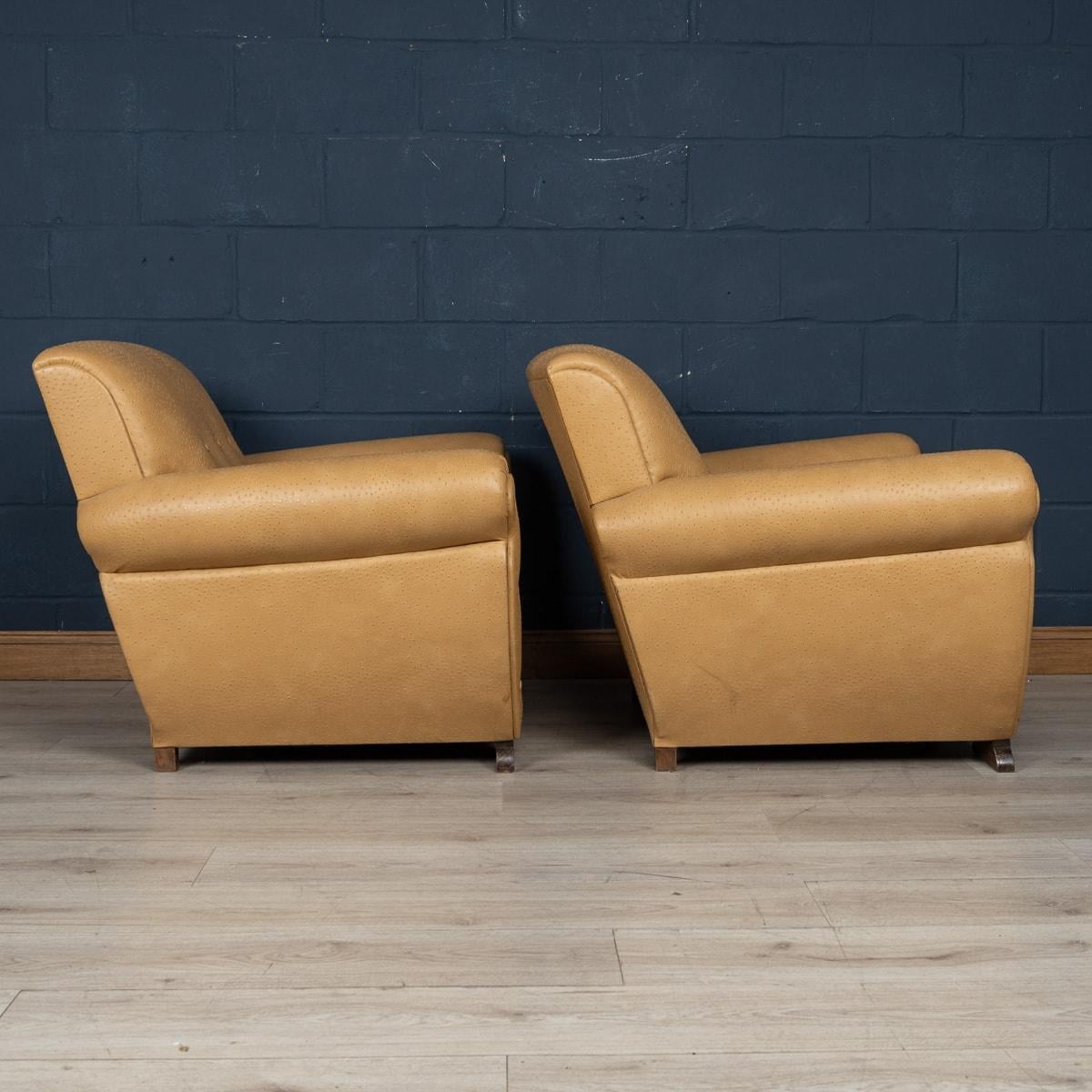 Faux Leather A 20th Century Pair Of English Beige Faux Ostrich Skin Leather Armchairs c.1960
