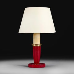 A 20th Century Red Leather Desk Lamp after Adnet