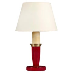 A 20th Century Red Leather Desk Lamp after Adnet