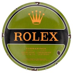 Un cartello pubblicitario smaltato Rolex Submariner del XX secolo
