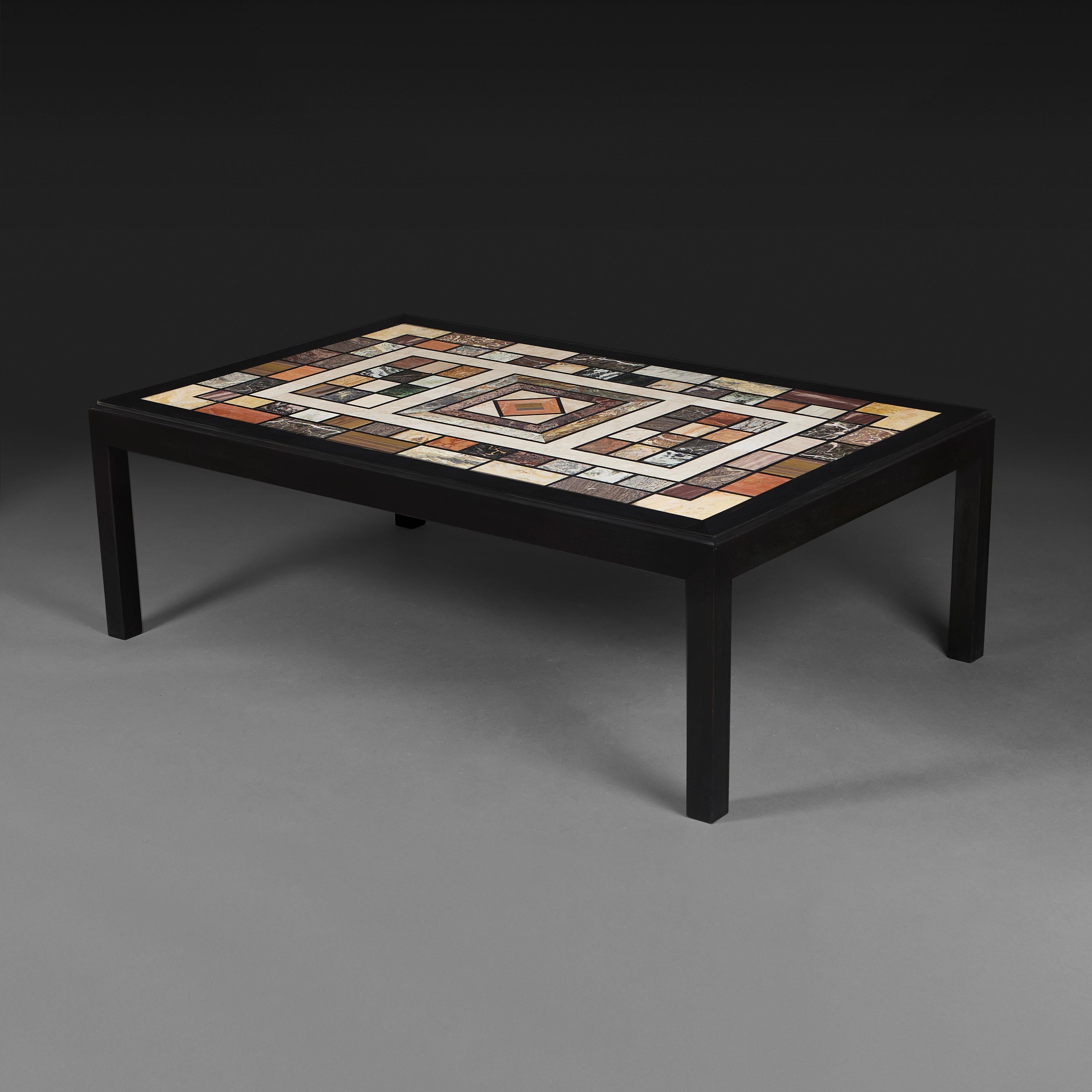 Italy, circa 1940

An early twentieth century coffee table of large scale, with specimen marble top, the granite borders veneered with samples of many varied European marbles, including Black Portoro, Rojo Alicante, Rosso Montepulciano, Guatemala
