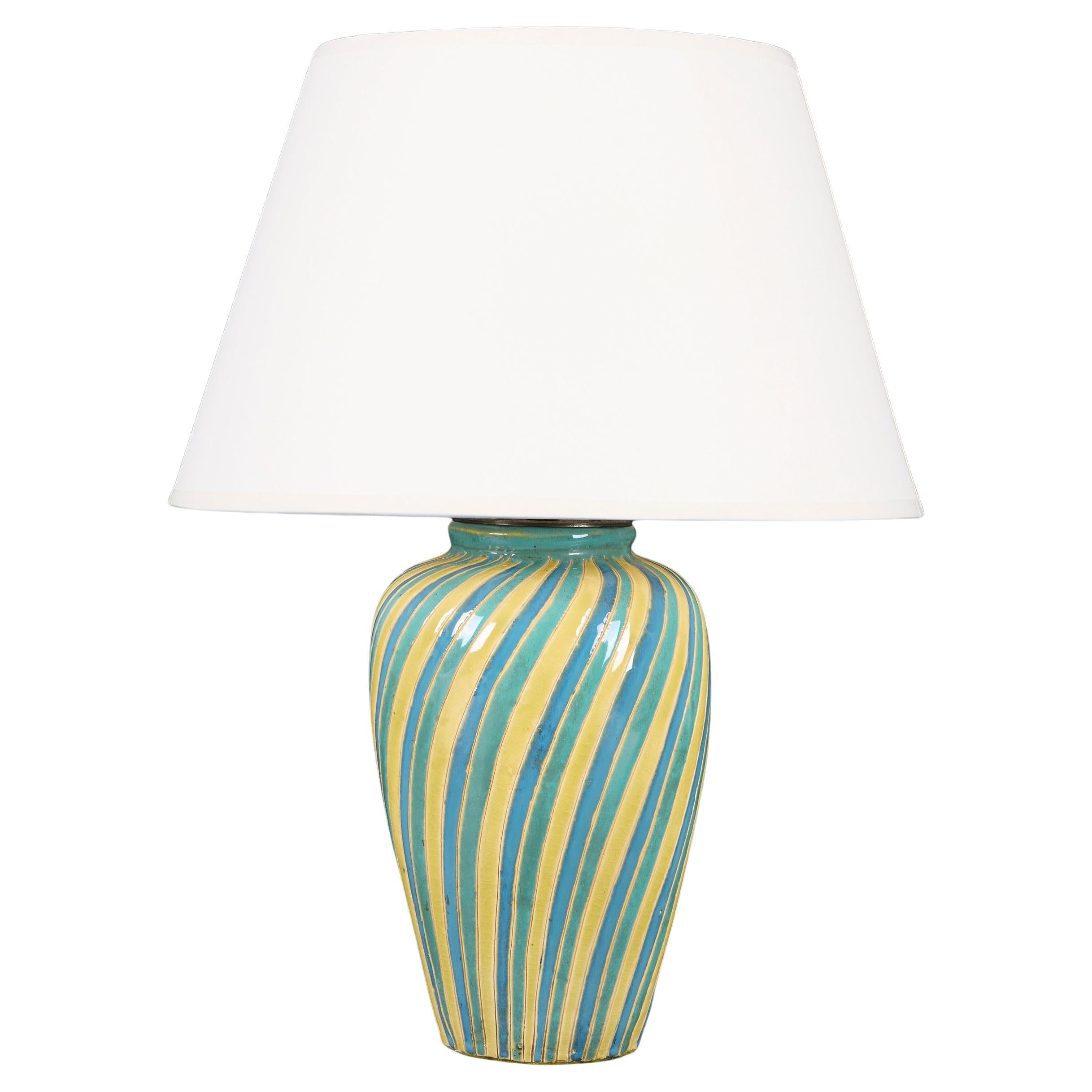 A 20th Century Swirling Striped Art Pottery Lamp For Sale