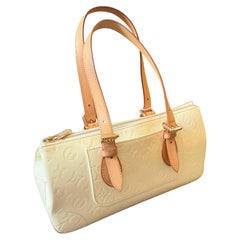 A 21st Century Louis Vuitton Vernis Yellow Rosewood Avenue Hand-Bag