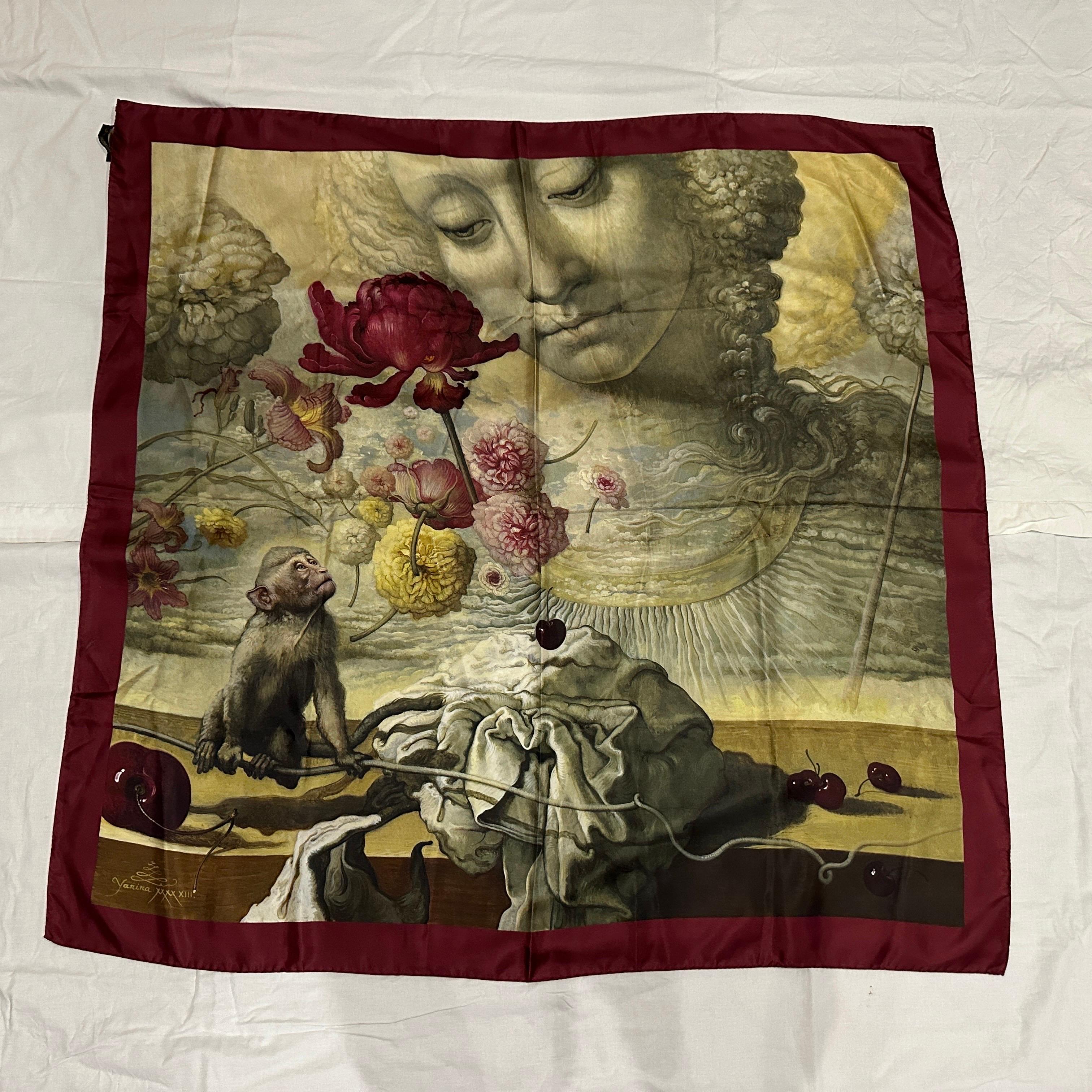 This amazing Flowers and Dancing Monkey Italian Silk Scarf with Border blends playful charm with elegance, featuring vibrant florals and a whimsical monkey design on luxurious silk. It's in perfect condition