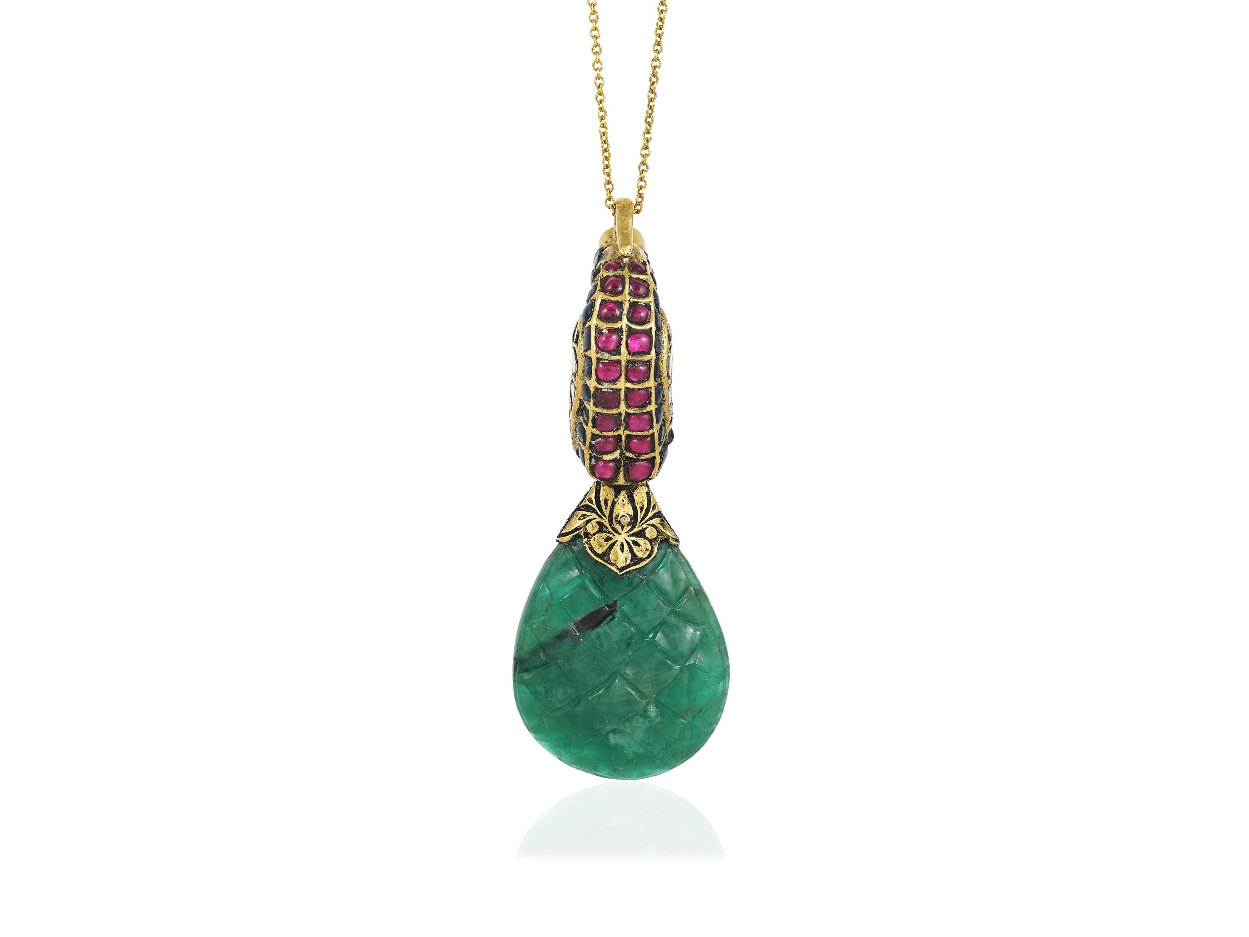 A 22K gold Indian Emerald and Diamond polki peacock pendant 1