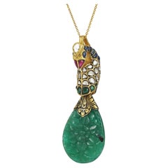 A 22K gold Indian Emerald and Diamond polki peacock pendant