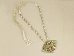 A 22K gold Nephrite jade indian pendant of Lord Krishna in diamond and ruby