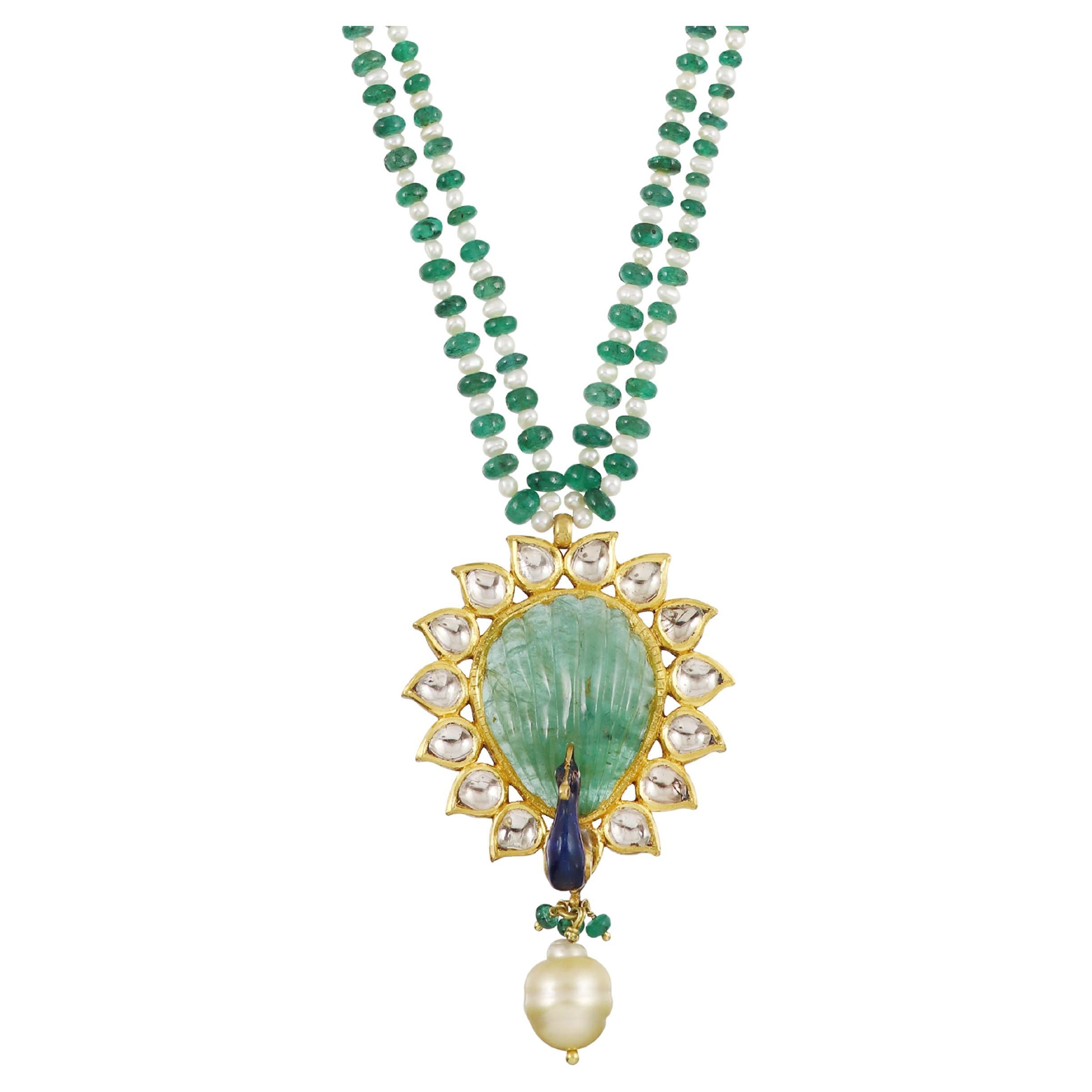 A 22K Indian emerald and polki peacock inspired pendant with meenakari (enamel)