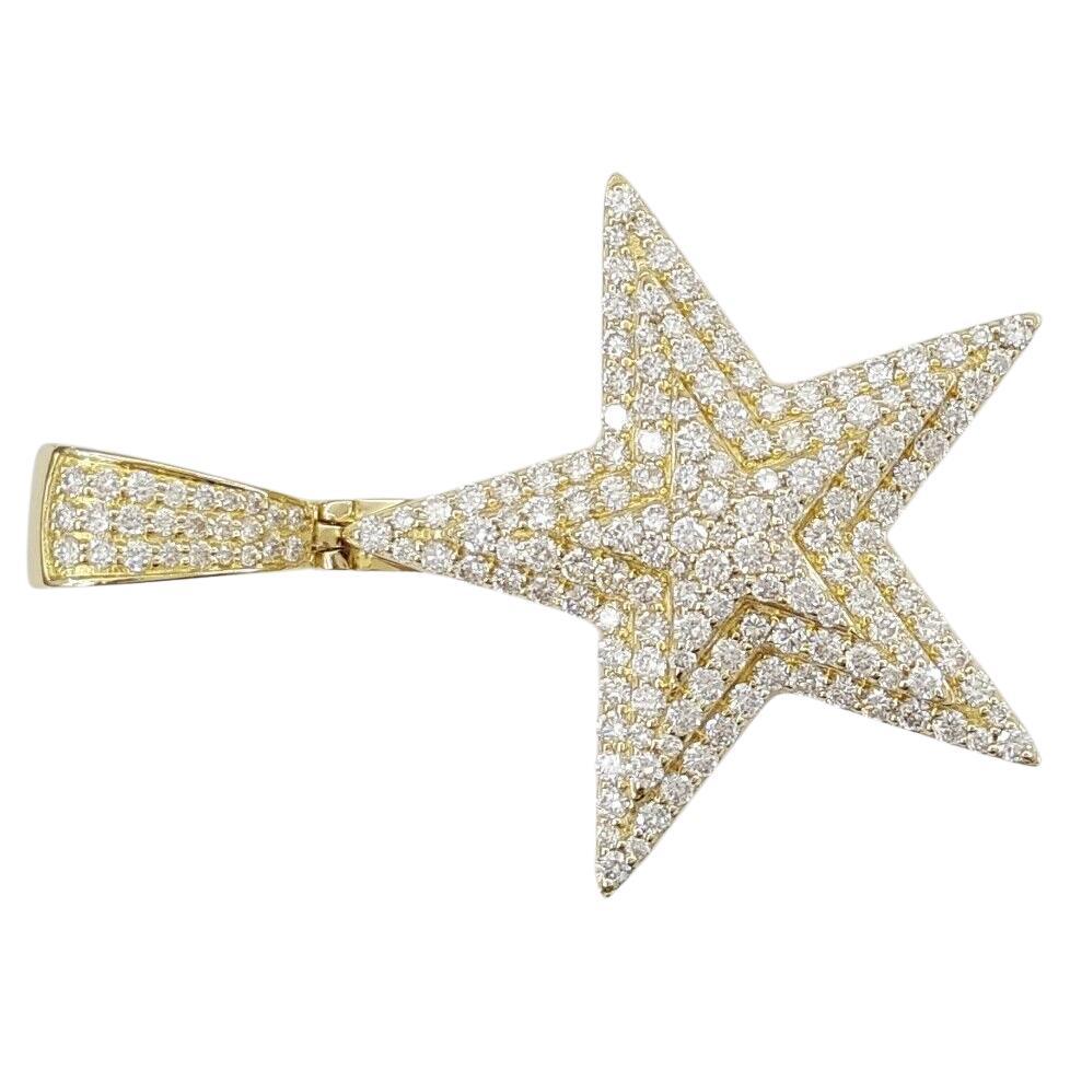 A 2.3 ct Total Weight Round Brilliant Cut Diamond Star Pendant is offered in 14k Yellow Gold. The star itself has a weight of 10.7 grams and dimensions of 32.4 mm in length (46.8 mm with Bail), 34 mm in width, and 8.3 mm in thickness.

Comprising