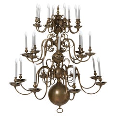A 24 Light 48 Inch Diameter Dutch Baroque Style 3 Tier Brass Chandelier