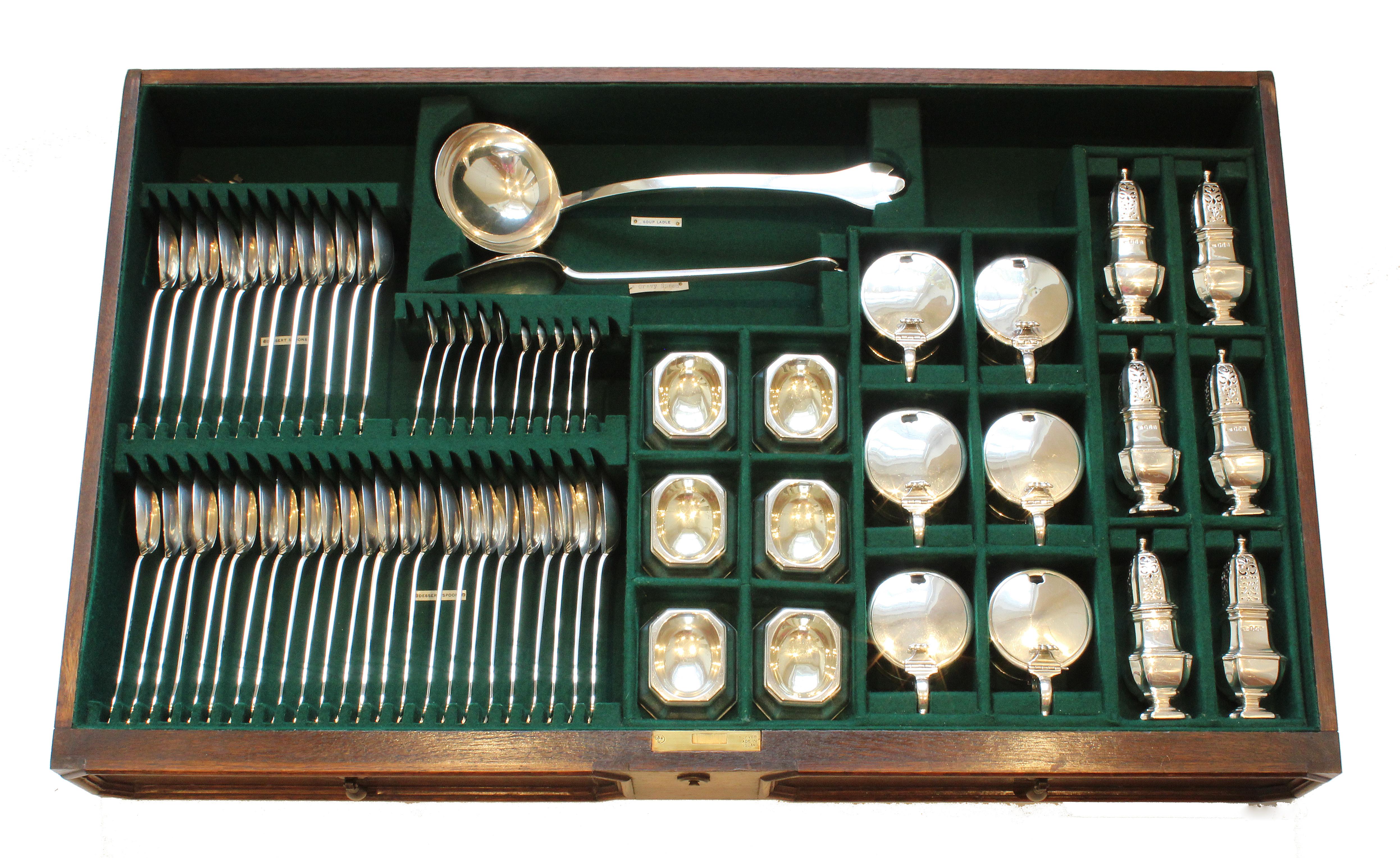 A very fine and extensive 255 piece canteen of silver trefid pattern flatware for 36 people, made by  Garrards of London.  This rare trefid pattern service was made in 1911, the year of the coronation of King George V, by Sebastion Garrard of