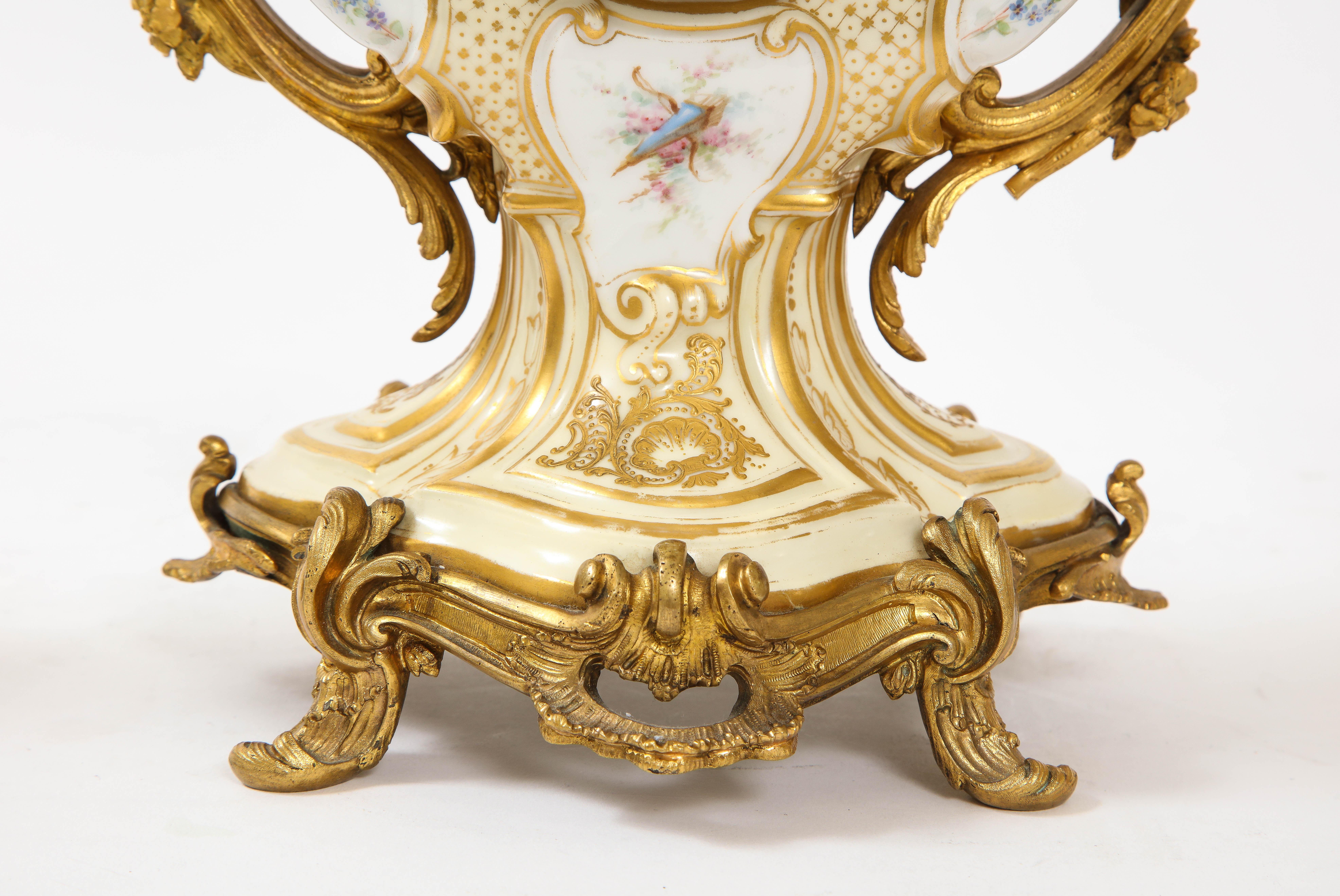 3-Piece Sevres Porcelain and Dore Bronze Mnt. Clock and Candelabra Garniture For Sale 9